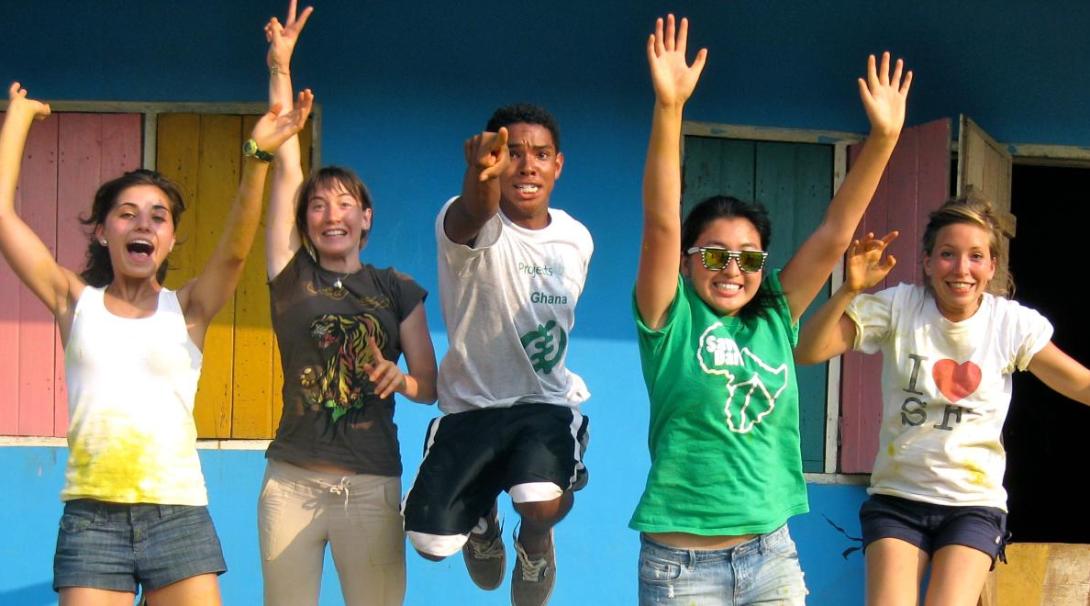 High school volunteers jump for joy High school students on volunteer project